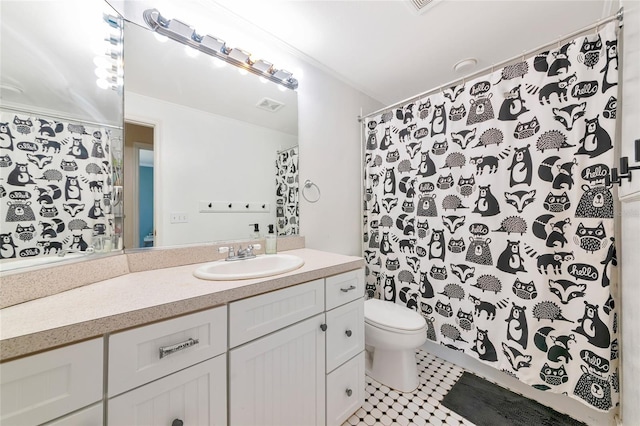 230 Fareham Dr, Venice, FL 34293 - bathroom with vanity, toilet, tile patterned flooring, and a shower with curtain