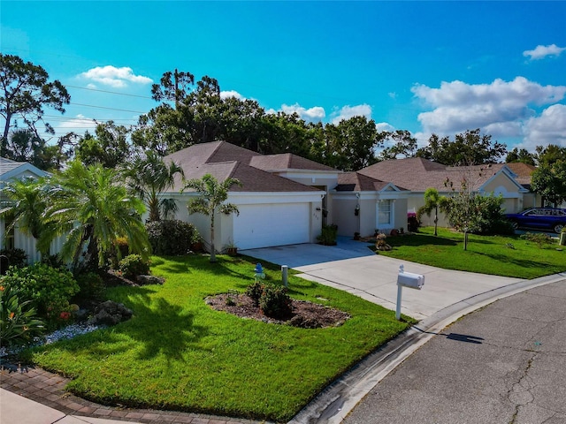 230 Fareham Dr, Venice, FL 34293 - view of front of property with a garage, concrete driveway, a front lawn, and stucco siding