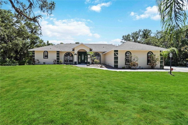 296 Pine Ranch Trl, Osprey, FL 34229 - single story home with a front lawn and stucco siding