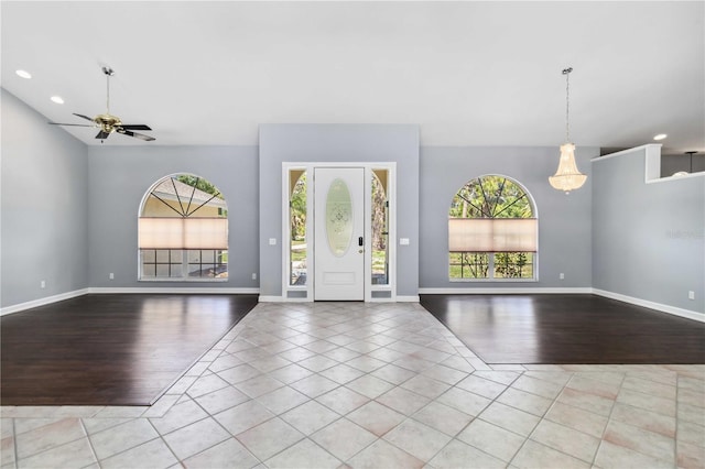296 Pine Ranch Trl, Osprey, FL 34229 - entrance foyer with a ceiling fan, wood finished floors, recessed lighting, and baseboards