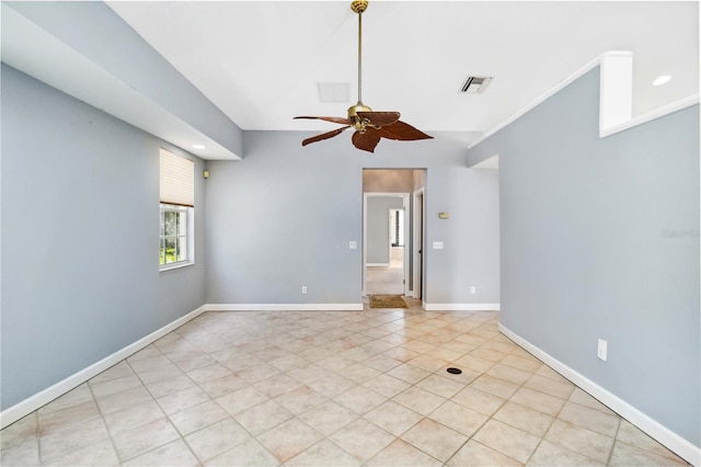 296 Pine Ranch Trl, Osprey, FL 34229 - spare room with ceiling fan, light tile patterned flooring, and baseboards