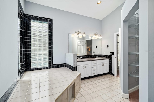 296 Pine Ranch Trl, Osprey, FL 34229 - bathroom with double vanity and tile patterned floors