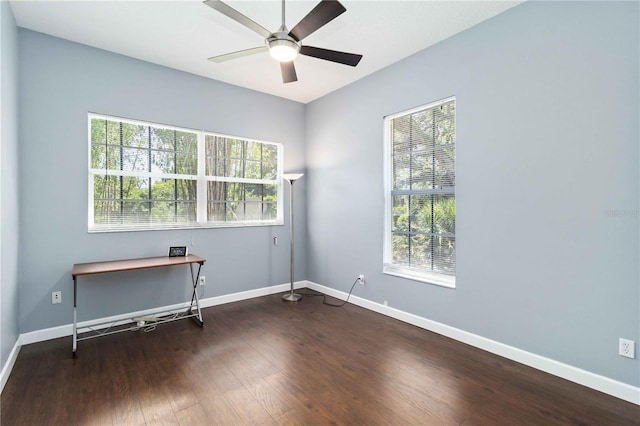 296 Pine Ranch Trl, Osprey, FL 34229 - spare room with plenty of natural light, ceiling fan, wood finished floors, and baseboards