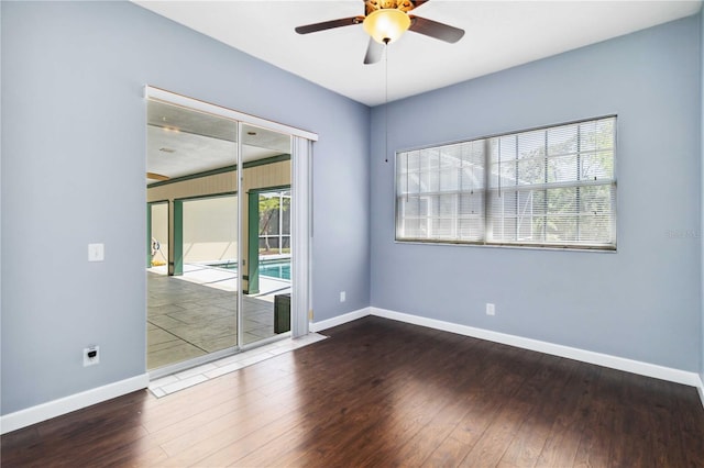 296 Pine Ranch Trl, Osprey, FL 34229 - unfurnished room featuring a ceiling fan, wood-type flooring, and baseboards