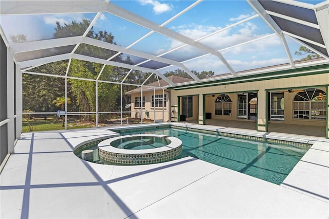 296 Pine Ranch Trl, Osprey, FL 34229 - view of swimming pool featuring a patio area, a ceiling fan, a pool with connected hot tub, and glass enclosure