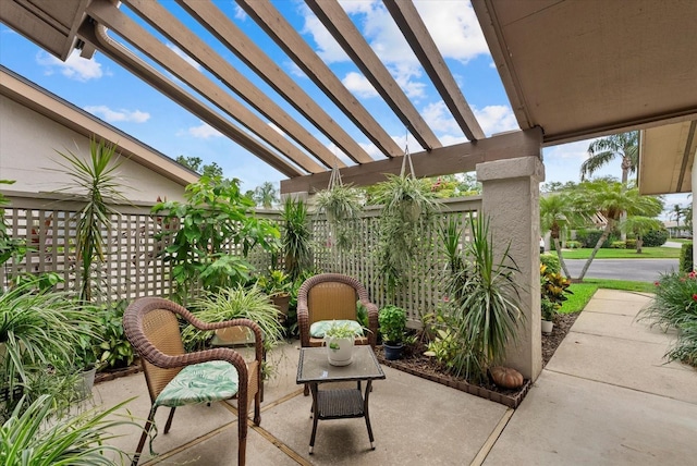 4505 Kingsmere Unit 2, Sarasota, FL 34235 - view of patio featuring a pergola