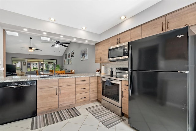 4505 Kingsmere Unit 2, Sarasota, FL 34235 - kitchen featuring black appliances, a sink, backsplash, ceiling fan, and light brown cabinetry