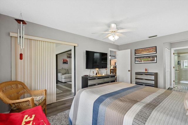 4505 Kingsmere Unit 2, Sarasota, FL 34235 - bedroom with a closet, wood finished floors, and ceiling fan