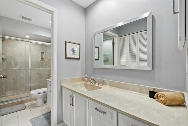 4505 Kingsmere Unit 2, Sarasota, FL 34235 - full bath with vanity, toilet, a shower stall, and tile patterned flooring