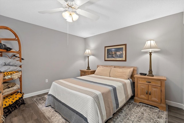 4505 Kingsmere Unit 2, Sarasota, FL 34235 - bedroom with wood finished floors, baseboards, and a ceiling fan