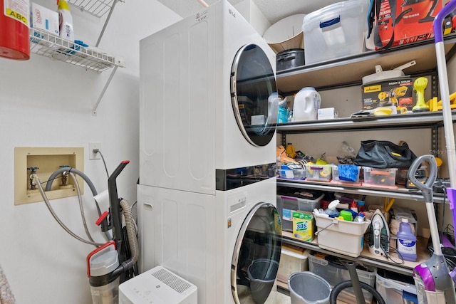 4505 Kingsmere Unit 2, Sarasota, FL 34235 - washroom with stacked washer and clothes dryer