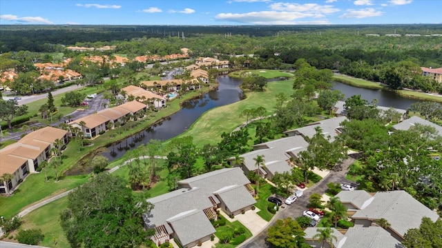 4505 Kingsmere Unit 2, Sarasota, FL 34235 - aerial view of property's location with nearby suburban area, a nearby body of water, a golf course, and a forest