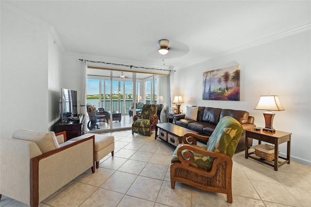 1280 Dolphin Bay Way Unit 204, Sarasota, FL 34242 - living area featuring crown molding, light tile patterned floors, a ceiling fan, and baseboards