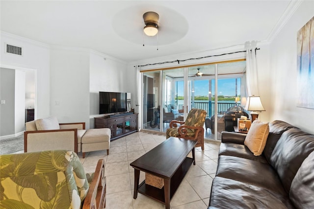 1280 Dolphin Bay Way Unit 204, Sarasota, FL 34242 - living area featuring ceiling fan, ornamental molding, and light tile patterned flooring