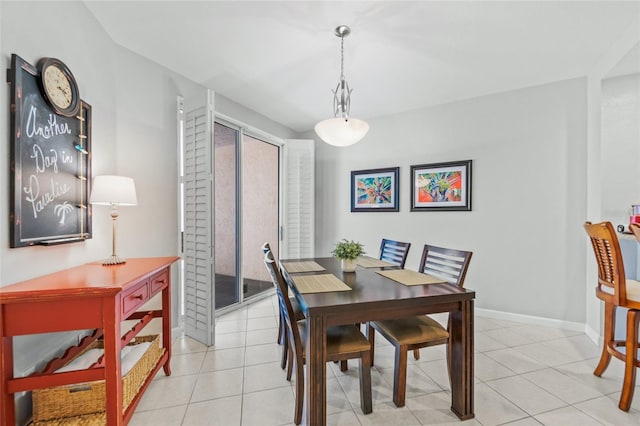 1280 Dolphin Bay Way Unit 204, Sarasota, FL 34242 - dining space featuring light tile patterned floors and baseboards