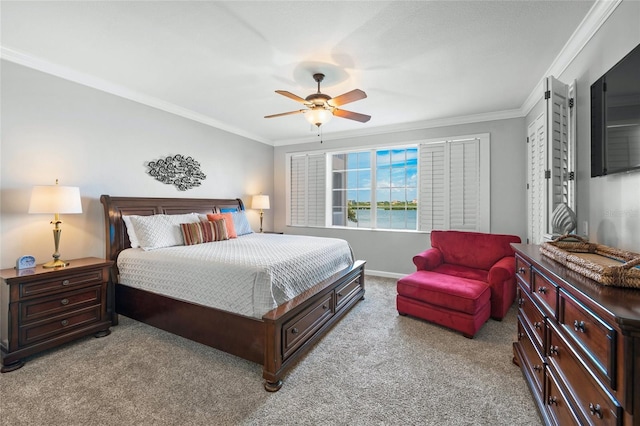 1280 Dolphin Bay Way Unit 204, Sarasota, FL 34242 - bedroom featuring ornamental molding, carpet flooring, a ceiling fan, and baseboards