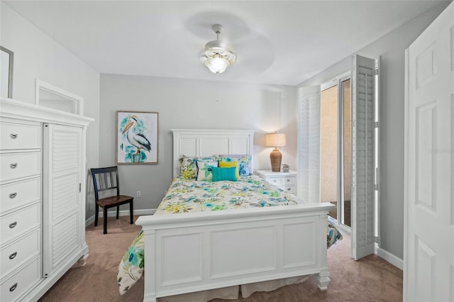 1280 Dolphin Bay Way Unit 204, Sarasota, FL 34242 - bedroom featuring carpet and baseboards