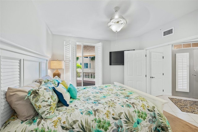 1280 Dolphin Bay Way Unit 204, Sarasota, FL 34242 - bedroom with access to exterior, tile patterned flooring, and ceiling fan