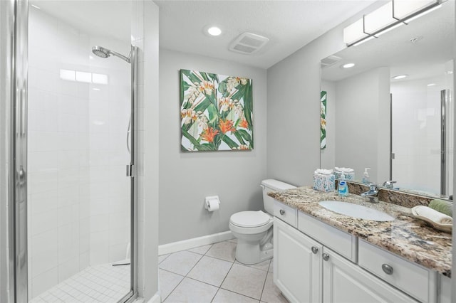 1280 Dolphin Bay Way Unit 204, Sarasota, FL 34242 - bathroom featuring a stall shower, tile patterned floors, toilet, vanity, and recessed lighting