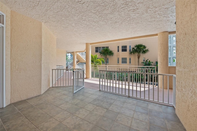 1280 Dolphin Bay Way Unit 204, Sarasota, FL 34242 - view of patio with a balcony