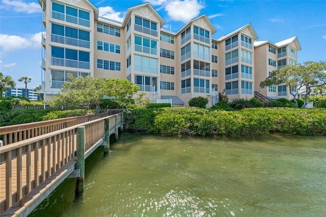1280 Dolphin Bay Way Unit 204, Sarasota, FL 34242 - dock area featuring a water view