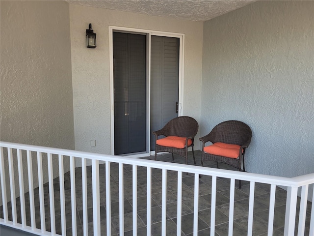 1280 Dolphin Bay Way Unit 204, Sarasota, FL 34242 - doorway to property featuring stucco siding
