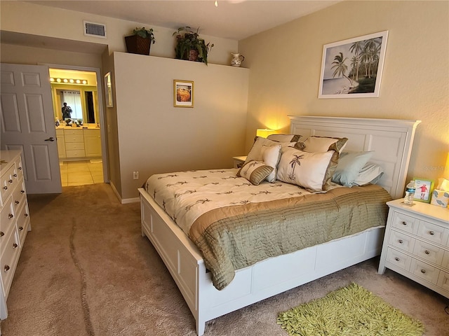 7273 Cedar Hollow Cir Unit 102, Bradenton, FL 34203 - bedroom with carpet and connected bathroom