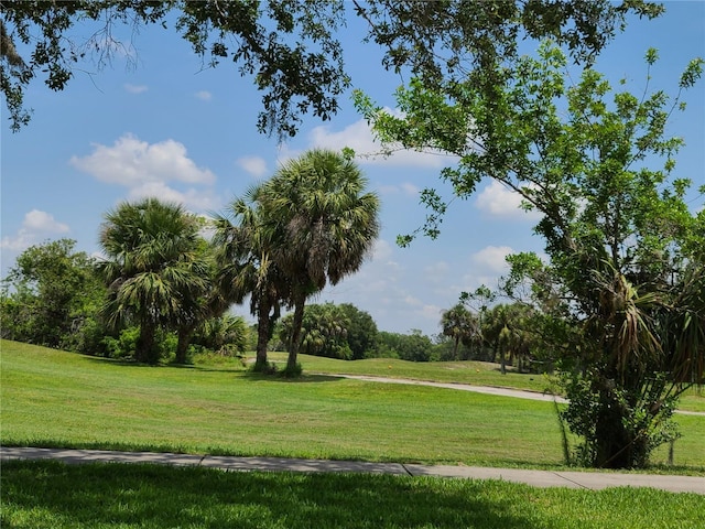 7273 Cedar Hollow Cir Unit 102, Bradenton, FL 34203 - view of community featuring a yard