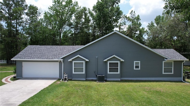 3287 Rackley Rd, Brooksville, FL 34604 - ranch-style house with roof with shingles, a garage, concrete driveway, and a front yard