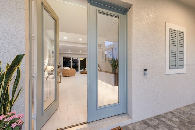 5718 Title Row Dr, Bradenton, FL 34210 - doorway to property featuring stucco siding