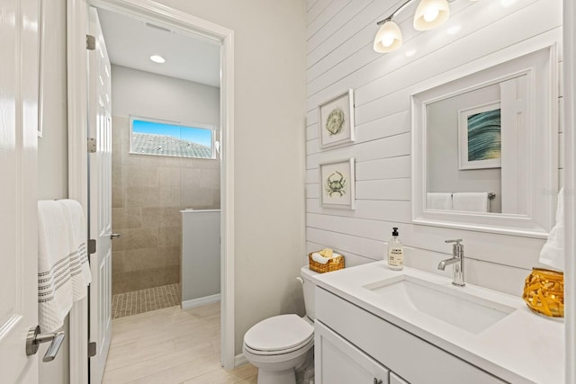 5718 Title Row Dr, Bradenton, FL 34210 - bathroom with vanity, walk in shower, and wood walls