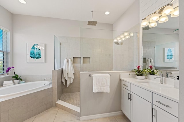 5718 Title Row Dr, Bradenton, FL 34210 - full bath featuring vanity, a bath, a walk in shower, and tile patterned flooring