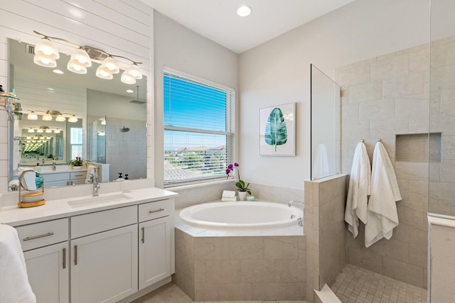 5718 Title Row Dr, Bradenton, FL 34210 - full bath with a garden tub, vanity, and a walk in shower