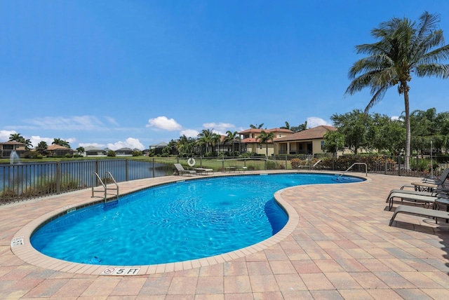 5718 Title Row Dr, Bradenton, FL 34210 - community pool featuring a patio and a water view
