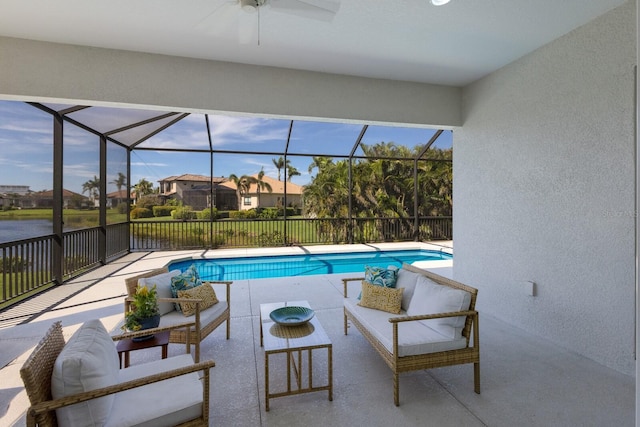 5718 Title Row Dr, Bradenton, FL 34210 - view of swimming pool featuring a patio area, an outdoor hangout area, ceiling fan, and a residential view