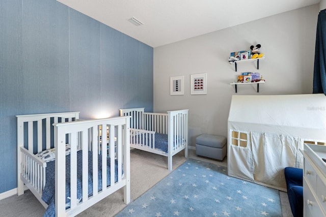 5718 Title Row Dr, Bradenton, FL 34210 - bedroom with carpet and a nursery area
