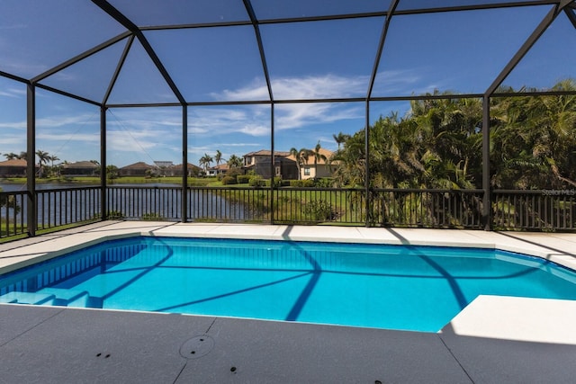 5718 Title Row Dr, Bradenton, FL 34210 - view of pool featuring a water view, a lanai, and a residential view