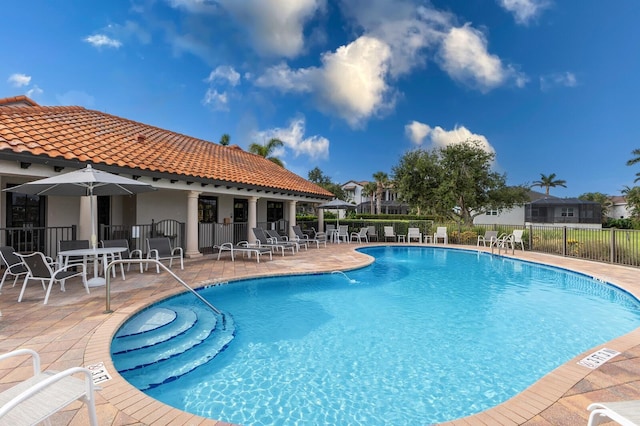 5718 Title Row Dr, Bradenton, FL 34210 - community pool featuring a patio