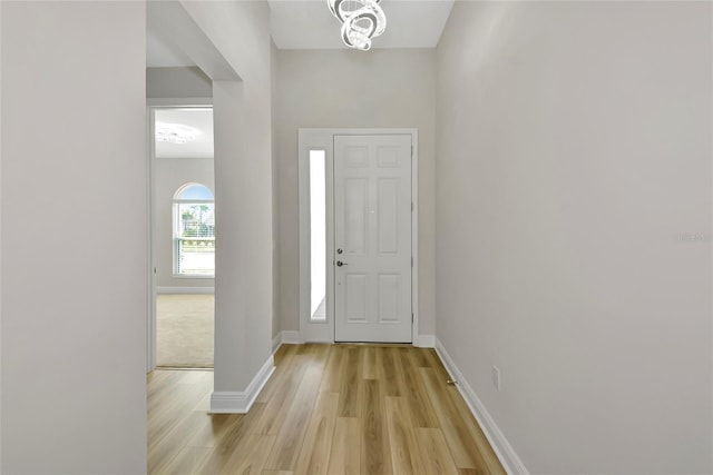 12613 Oak Hill Way, Parrish, FL 34219 - foyer entrance featuring light wood finished floors and baseboards