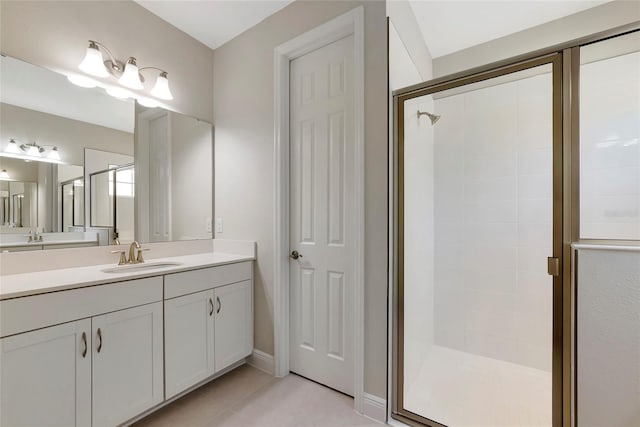 12613 Oak Hill Way, Parrish, FL 34219 - bathroom with a shower stall, tile patterned floors, and vanity