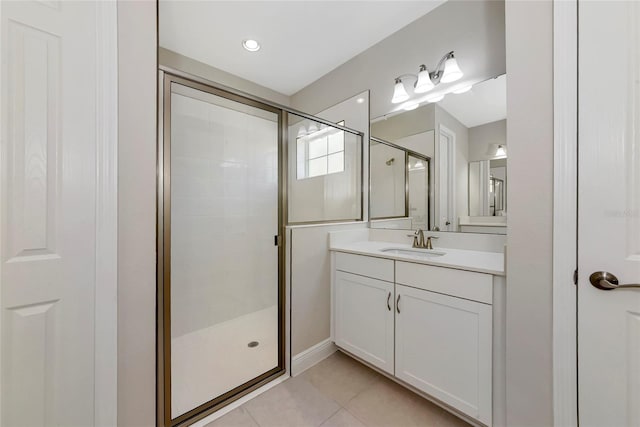 12613 Oak Hill Way, Parrish, FL 34219 - bathroom featuring a stall shower, vanity, and tile patterned floors