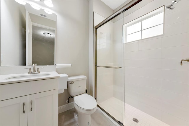 12613 Oak Hill Way, Parrish, FL 34219 - bathroom featuring a shower stall, toilet, vanity, and baseboards