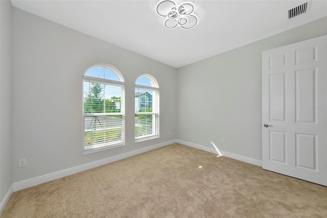 12613 Oak Hill Way, Parrish, FL 34219 - carpeted spare room featuring baseboards