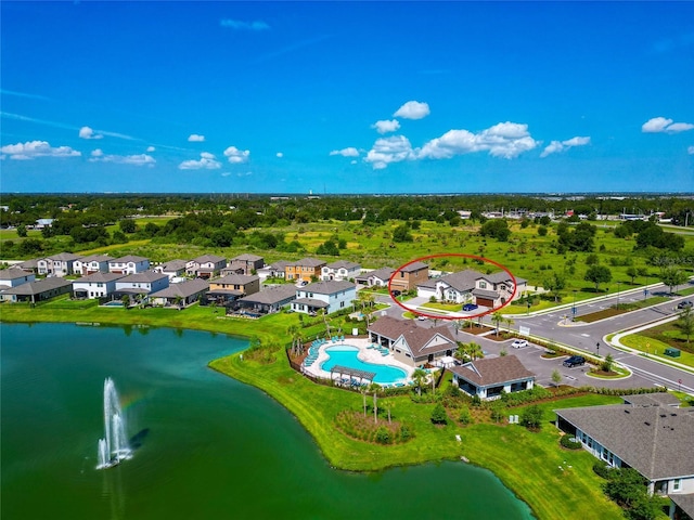 12613 Oak Hill Way, Parrish, FL 34219 - aerial perspective of suburban area featuring a pool area and a nearby body of water