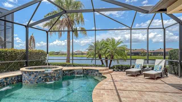 5622 Arnie Loop, Lakewood Ranch, FL 34211 - view of pool featuring a lanai, a water view, a patio, a pool with connected hot tub, and a residential view