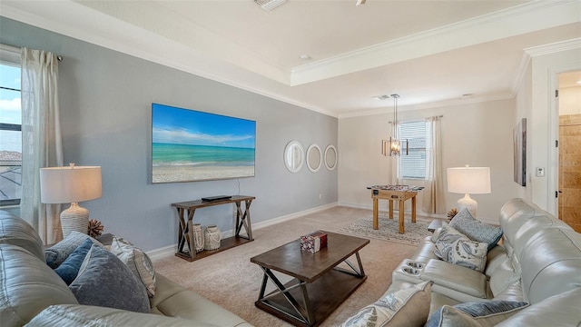 5622 Arnie Loop, Lakewood Ranch, FL 34211 - carpeted living area featuring baseboards, crown molding, and a chandelier