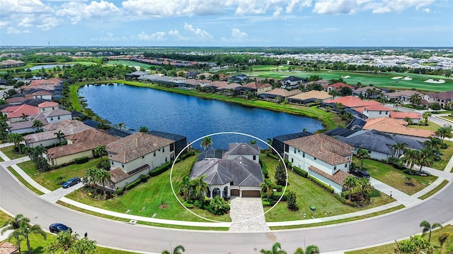 5622 Arnie Loop, Lakewood Ranch, FL 34211 - aerial perspective of suburban area with a large body of water and a golf course