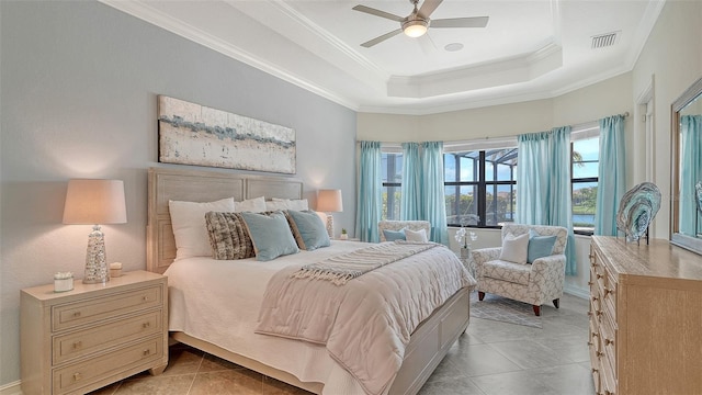 5622 Arnie Loop, Lakewood Ranch, FL 34211 - bedroom with ornamental molding, light tile patterned floors, a raised ceiling, and ceiling fan
