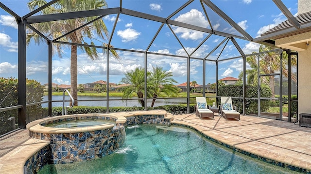 5622 Arnie Loop, Lakewood Ranch, FL 34211 - view of swimming pool with a lanai, a pool with connected hot tub, a patio area, a water view, and a residential view