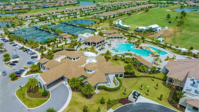 5622 Arnie Loop, Lakewood Ranch, FL 34211 - aerial view of residential area with a large body of water and a pool area